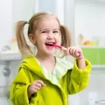 Brush or Floss First? What's Best for Kids' Teeth?