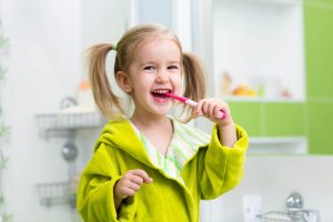 Brush or Floss First? What's Best for Kids' Teeth?