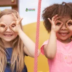 Two girls making playful gestures