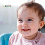 Smiling baby with bright eyes