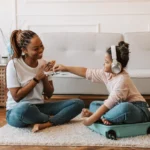 Mother and daughter playing together