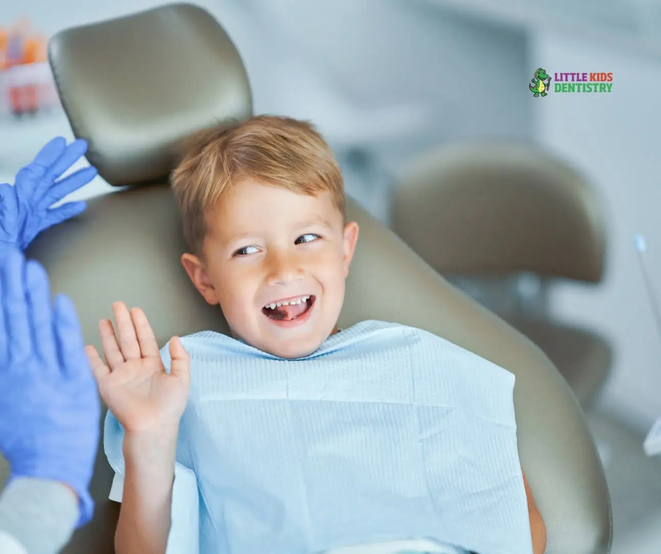 Smiling boy in dental chair